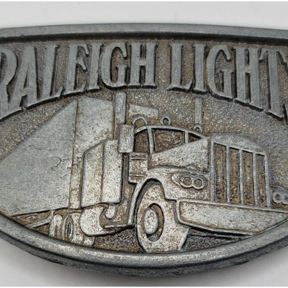 Vintage Raleigh Lights Belt Buckle Trucker Trucking Transportation Pewter - Picture 2 of 3